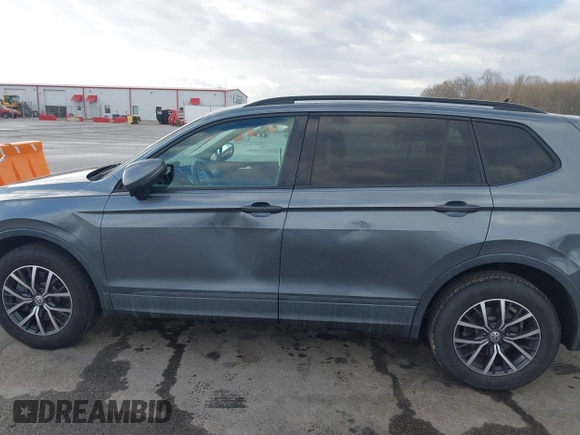 2021 Volkswagen Tiguan S with VIN 3VV1B7AX8MM016874, listed as a IAAI auction lot 41633090 with 76,857 mi miles and . Bid and sale history available at DreamBid. Image 17.