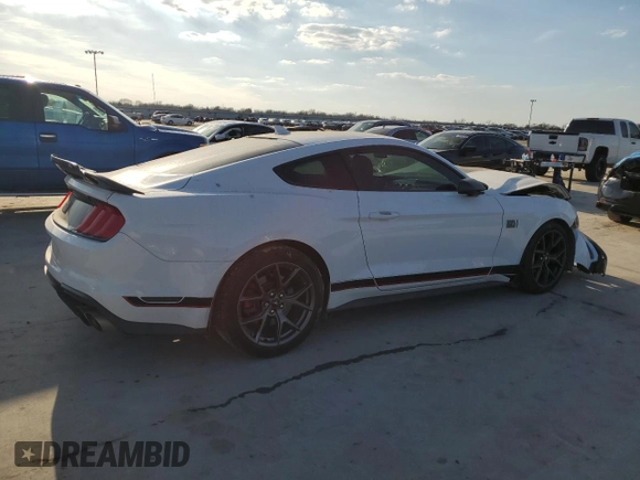 2022 Ford Mustang Mach 1 с VIN 1FA6P8R0XN5554329, выставлен на аукционе Copart как лот 46728835 с пробегом 22 171 миль миль и Списание • Salvage title. История ставок и продаж доступна на DreamBid. Изображение 3.
