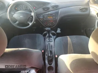 2000 Ford Focus LX with VIN 1FAFP33P6YW376765, listed as a Copart auction lot 75347554 with 189,468 mi miles and Salvage Title. Bid and sale history available at DreamBid. Image 8.