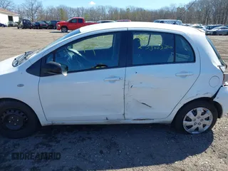 2009 Toyota Yaris with VIN JTDKT903X95244723, listed as a IAAI auction lot 41906848 with Not Provided miles. Bid and sale history available at carsss.com. Image 6.