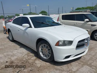 2013 Dodge Charger SXT with VIN 2C3CDXHG0DH664865, listed as a IAAI auction lot 41914053 with 195,211 mi miles. Bid and sale history available at carsss.com. Image 1.