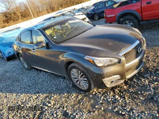 2015 Infiniti Q70 z VIN JN1BY1PR2FM830124, wystawiony jako Copart lot #42536205 z przebiegiem 138 498 mil mil oraz Szkoda całkowita • Salvage title. Historia ofert i sprzedaży dostępna na DreamBid. Obrazek 4.