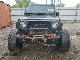 2016 Jeep Wrangler Unlimited Sport z VIN 1C4BJWDG4GL194296, wystawiony jako Copart lot #59397285 z przebiegiem 174 343 mil mil oraz Szkoda całkowita • Salvage title. Historia ofert i sprzedaży dostępna na DreamBid. Obrazek 5.