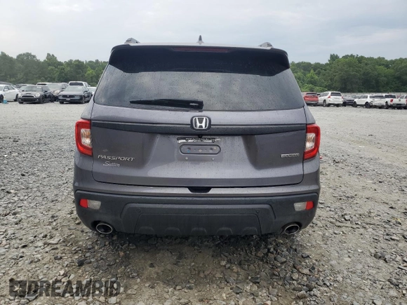 2021 Honda Passport Touring z VIN 5FNYF7H94MB005741, wystawiony jako Copart lot #57626664 z przebiegiem Nie podano mil oraz Szkoda całkowita • Salvage title. Historia ofert i sprzedaży dostępna na DreamBid. Obrazek 6.
