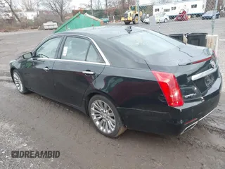 2014 Cadillac CTS Luxury AWD with VIN 1G6AX5SX9E0195923, listed as a IAAI auction lot 40946334 with Not Provided miles and . Bid and sale history available at carsss.com. Image 3.