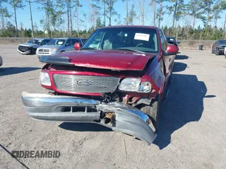 2002 Ford F-150 XL with VIN 1FTRX17W62NB13010, listed as a IAAI auction lot 41689466 with 208,160 mi miles. Bid and sale history available at carsss.com. Image 6.