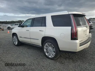 2015 Cadillac Escalade Platinum z VIN 1GYS4PKJ5FR574930, wystawiony jako Copart lot #74691204 z przebiegiem Nie podano mil oraz Szkoda całkowita • Salvage title. Historia ofert i sprzedaży dostępna na DreamBid. Obrazek 2.