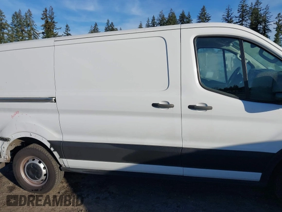 2021 Ford Transit Cargo z VIN 1FTYE1Y89MKA16809, wystawiony jako IAAI lot #41643195 z przebiegiem 7 407 mil mil oraz . Historia ofert i sprzedaży dostępna na DreamBid. Obrazek 13.