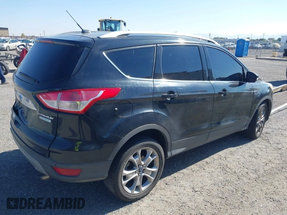 2014 Ford Escape Titanium with VIN 1FMCU0JX6EUB49652, listed as a IAAI auction lot 42136494 with 195,108 mi miles. Bid and sale history available at carsss.com. Image 4.