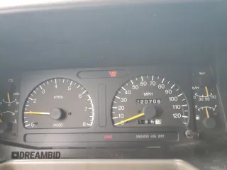 1995 Isuzu Rodeo LS with VIN 4S2CG58V9S4342391, listed as a Copart auction lot 71076344 with 220,708 mi miles and Salvage Title. Bid and sale history available at carsss.com. Image 9.