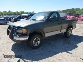 2003 Ford F-150 XL with VIN 1FTRF18243NB29920, listed as a IAAI auction lot 42037138 with 230,215 mi miles and . Bid and sale history available at DreamBid. Image 2.