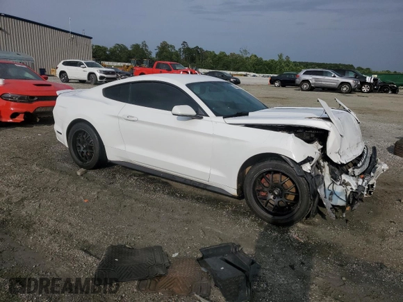 2015 Ford Mustang V6 with VIN 1FA6P8AM2F5358062, listed as a Copart auction lot 60034595 with 128,750 mi miles and Salvage title. Bid and sale history available at DreamBid. Image 4.
