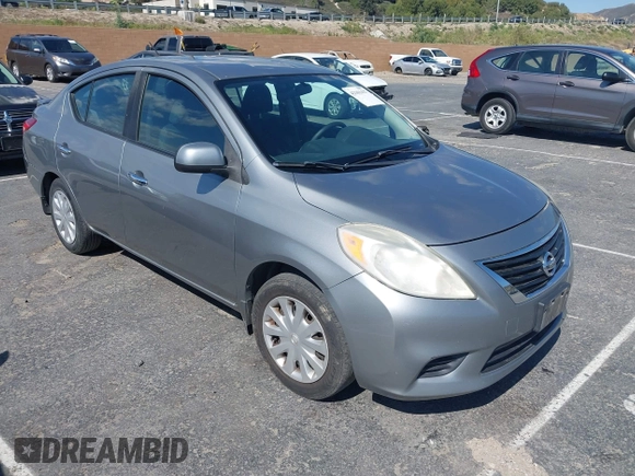 2014 Nissan Versa SV with VIN 3N1CN7AP9EL834221, listed as a IAAI auction lot 42161427 with 227,391 mi miles. Bid and sale history available at carsss.com. Image 1.