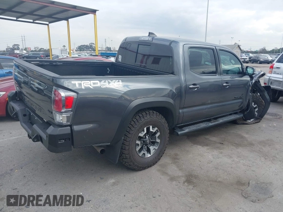2021 Toyota Tacoma SR z VIN 3TMCZ5AN9MM397611, wystawiony jako IAAI lot #41467705 z przebiegiem 65 191 mil mil oraz . Historia ofert i sprzedaży dostępna na DreamBid. Obrazek 4.