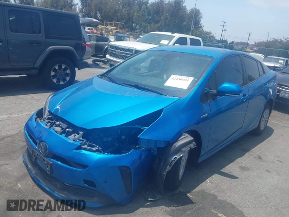 2021 Toyota Prius L Eco with VIN JTDKAMFUXM3134462, listed as a IAAI auction lot 42450931 with 89,239 mi miles and . Bid and sale history available at DreamBid. Image 17.