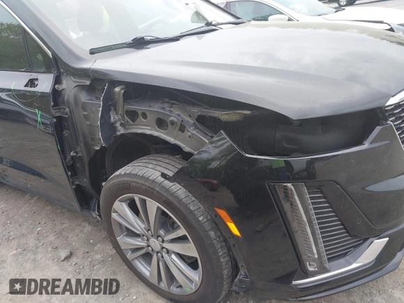 2022 Cadillac XT6 Premium Luxury with VIN 1GYKPDRS5NZ149971, listed as a IAAI auction lot 42259140 with 51,704 mi miles and . Bid and sale history available at DreamBid. Image 17.