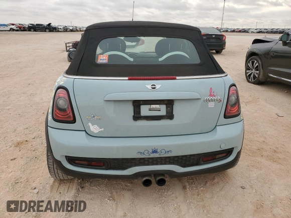 2014 MINI Convertible S with VIN WMWZP3C56ET707425, listed as a Copart auction lot 50894965 with 100,116 mi miles and Salvage Title. Bid and sale history available at DreamBid. Image 6.
