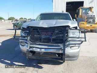 2017 GMC Sierra 1500 SLE with VIN 3GTU2MEC0HG202074, listed as a IAAI auction lot 42067320 with 184,424 mi miles and . Bid and sale history available at DreamBid. Image 12.