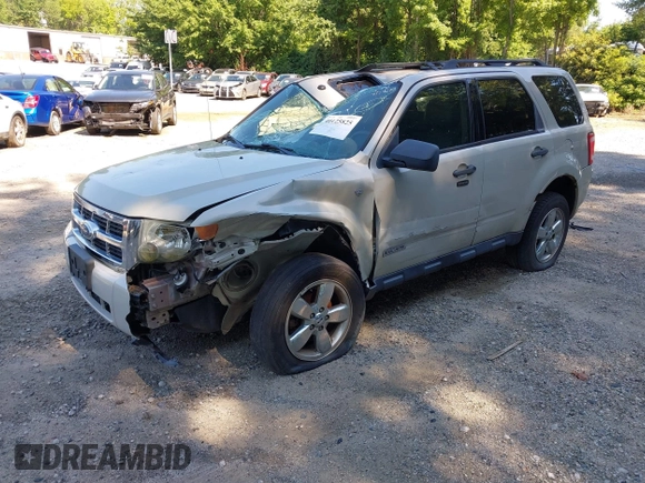 2008 Ford Escape XLT with VIN 1FMCU93198KE17879, listed as a IAAI auction lot 40125825 with 214,373 mi miles and . Bid and sale history available at DreamBid. Image 2.
