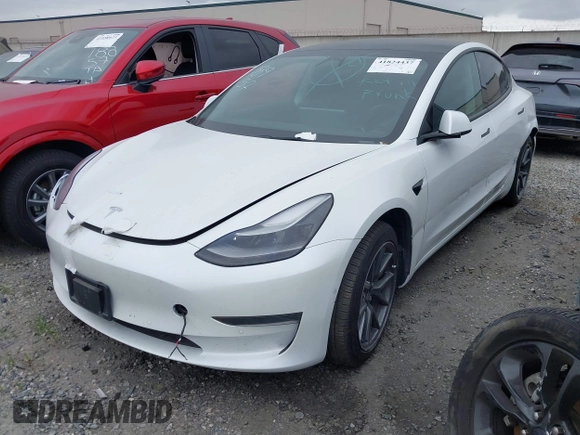 2022 Tesla Model 3 with VIN 5YJ3E1EA7NF108758, listed as a IAAI auction lot 41824437 with Not Provided miles. Bid and sale history available at carsss.com. Image 25.