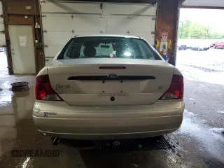 2003 Ford Focus SE z VIN 1FAFP34P43W186633, wystawiony jako Copart lot #56899065 z przebiegiem Nie podano mil oraz Szkoda całkowita • Salvage title. Historia ofert i sprzedaży dostępna na DreamBid. Obrazek 6.