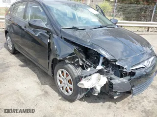 2013 Hyundai Accent GL with VIN KMHCT5AE9DU084356, listed as a IAAI auction lot 41817130 with 114,455 mi miles. Bid and sale history available at carsss.com. Image 6.