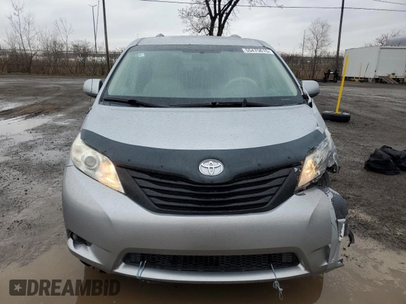 2012 Toyota Sienna with VIN 5TDZK3DC1CS213175, listed as a Copart auction lot 55475615 with 216,082 mi miles and Salvage title. Bid and sale history available at DreamBid. Image 5.