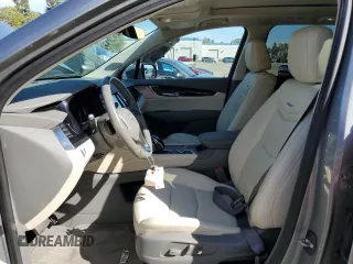 2023 Cadillac XT6 FWD Premium Luxury z VIN 1GYKPCRS5PZ212337, wystawiony jako Copart lot #46283655 z przebiegiem 15 660 mil mil oraz Szkody całkowita. Historia ofert i sprzedaży dostępna na DreamBid. Obrazek 7.