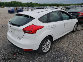 2016 Ford Focus SE with VIN 1FADP3K29GL374716, listed as a Copart auction lot 43301711 with 105,738 mi miles and Salvage Title. Bid and sale history available at carsss.com. Image 4.
