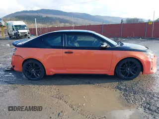 2015 Scion tC with VIN JTKJF5C77FJ008276, listed as a IAAI auction lot 41679236 with 90,987 mi miles. Bid and sale history available at carsss.com. Image 13.