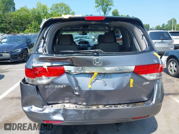 2014 Honda Odyssey EX-L with VIN 5FNRL5H63EB073585, listed as a IAAI auction lot 42673004 with 119,971 mi miles and . Bid and sale history available at DreamBid. Image 16.