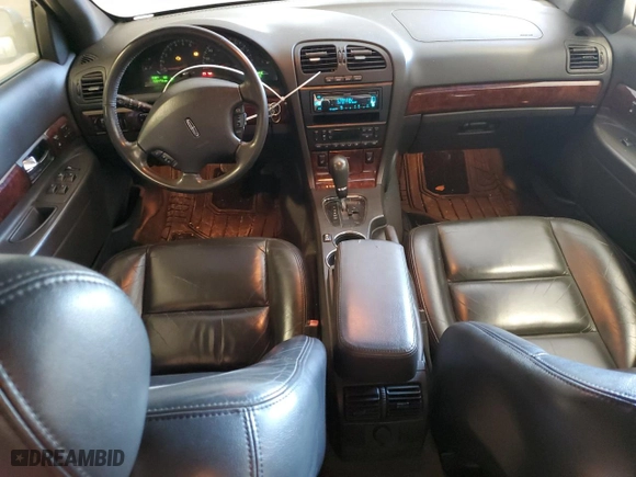 2002 Lincoln LS w/Base Pkg with VIN 1LNHM87A02Y625020, listed as a Copart auction lot 71872284 with 128,473 mi miles and Clean Title. Bid and sale history available at carsss.com. Image 8.
