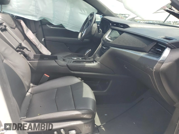 2021 Cadillac XT5 FWD Premium Luxury z VIN 1GYKNCR44MZ106982, wystawiony jako Copart lot #62234455 z przebiegiem 93 079 mil mil oraz Szkoda całkowita • Salvage title. Historia ofert i sprzedaży dostępna na DreamBid. Obrazek 7.