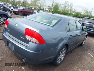 2011 Mercury Milan Premier z VIN 3MEHM0JG5BR604003, wystawiony jako IAAI lot #42120284 z przebiegiem 110 399 mil mil oraz . Historia ofert i sprzedaży dostępna na DreamBid. Obrazek 4.