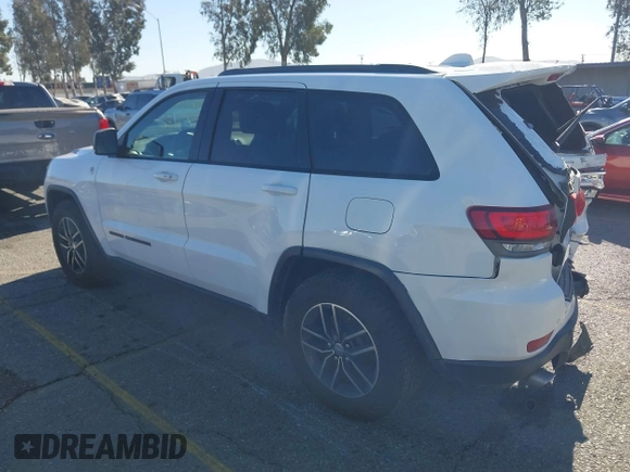 2017 Jeep Grand Cherokee Trailhawk with VIN 1C4RJFLGXHC959092, listed as a IAAI auction lot 41232281 with 108,659 mi miles and . Bid and sale history available at DreamBid. Image 3.