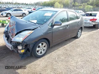 2007 Toyota Prius z VIN JTDKB20U273203420, wystawiony jako IAAI lot #42120951 z przebiegiem 261 452 mil mil oraz . Historia ofert i sprzedaży dostępna na DreamBid. Obrazek 2.