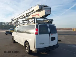 2013 Chevrolet Express Passenger LT with VIN 1GAZG1FG1D1159390, listed as a IAAI auction lot 41191409 with 176,899 mi miles and . Bid and sale history available at DreamBid. Image 3.