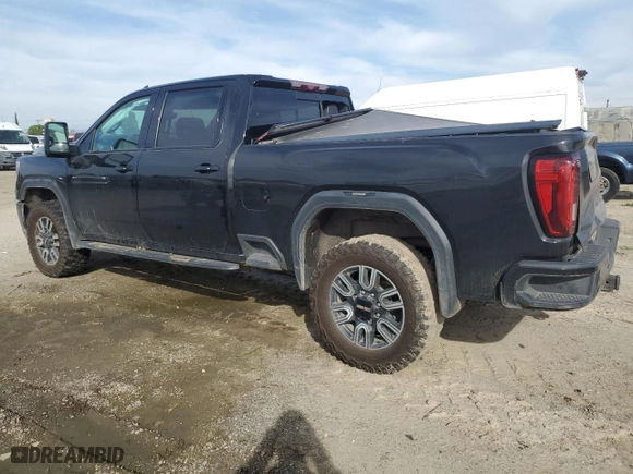2021 GMC Sierra 2500HD AT4 with VIN 1GT49PEY0MF193638, listed as a Copart auction lot 48352925 with 140,995 mi miles and Salvage Title. Bid and sale history available at carsss.com. Image 2.