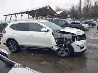 2017 Nissan Rogue SL with VIN 5N1AT2MV8HC830938, listed as a IAAI auction lot 41337476 with 117,940 mi miles. Bid and sale history available at carsss.com. Image 13.