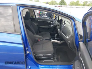 2016 Honda Fit EX z VIN JHMGK5H71GX041650, wystawiony jako IAAI lot #42658304 z przebiegiem 142 904 mil mil oraz . Historia ofert i sprzedaży dostępna na DreamBid. Obrazek 5.