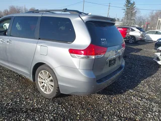 2011 Toyota Sienna XLE AAS with VIN 5TDYK3DC2BS025842, listed as a IAAI auction lot 41721185 with 228,959 mi miles and . Bid and sale history available at DreamBid. Image 3.