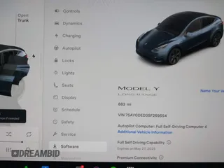 2025 Tesla Model Y Long Range z VIN 7SAYGDED3SF269554, wystawiony jako IAAI lot #41363465 z przebiegiem 883 mil mil oraz . Historia ofert i sprzedaży dostępna na DreamBid. Obrazek 7.