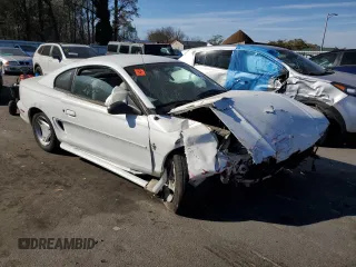 1997 Ford Mustang with VIN 1FALP4041VF194986, listed as a Copart auction lot 78841404 with 118,936 mi miles and Salvage Title. Bid and sale history available at carsss.com. Image 4.