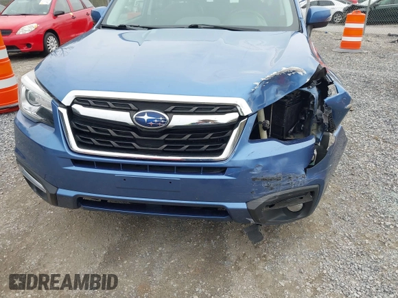 2017 Subaru Forester Touring with VIN JF2SJAWC1HH443799, listed as a IAAI auction lot 41943045 with 122,213 mi miles and . Bid and sale history available at DreamBid. Image 12.