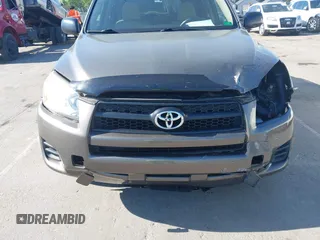 2009 Toyota RAV4 with VIN JTMZF33V395009905, listed as a IAAI auction lot 41881121 with 117,584 mi miles. Bid and sale history available at carsss.com. Image 6.