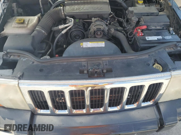 2008 Jeep Commander Sport with VIN 1J8HH48K08C209220, listed as a Copart auction lot 54920625 with 234,573 mi miles and Salvage Title. Bid and sale history available at DreamBid. Image 12.