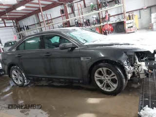 2015 Ford Taurus SEL with VIN 1FAHP2E89FG202589, listed as a IAAI auction lot 41592298 with 105,410 mi miles and . Bid and sale history available at carsss.com. Image 13.