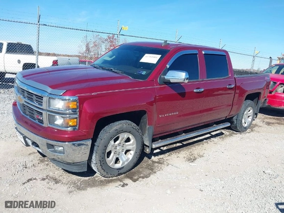 2015 Chevrolet Silverado 1500 LT with VIN 3GCUKREC6FG185646, listed as a IAAI auction lot 40702001 with 187,304 mi miles. Bid and sale history available at carsss.com. Image 2.
