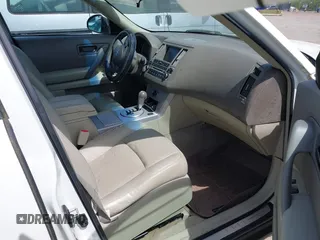 2004 Infiniti FX with VIN JNRBS08W44X403911, listed as a IAAI auction lot 42206281 with 153,345 mi miles. Bid and sale history available at carsss.com. Image 5.