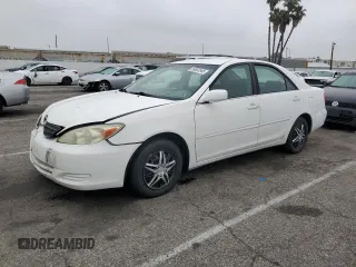 2002 Toyota Camry LE z VIN 4T1BE32K22U099325, wystawiony jako Copart lot #59802545 z przebiegiem 138 034 mil mil oraz Szkoda całkowita • Salvage title. Historia ofert i sprzedaży dostępna na DreamBid. Obrazek 1.